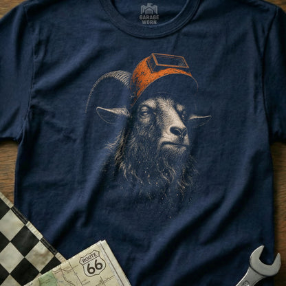 Navy t-shirt with a black goat wearing a welding mask graphic.