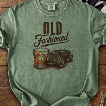 Green t-shirt with "OLD Fashioned" text, a glass of whiskey, and a hot rod car.