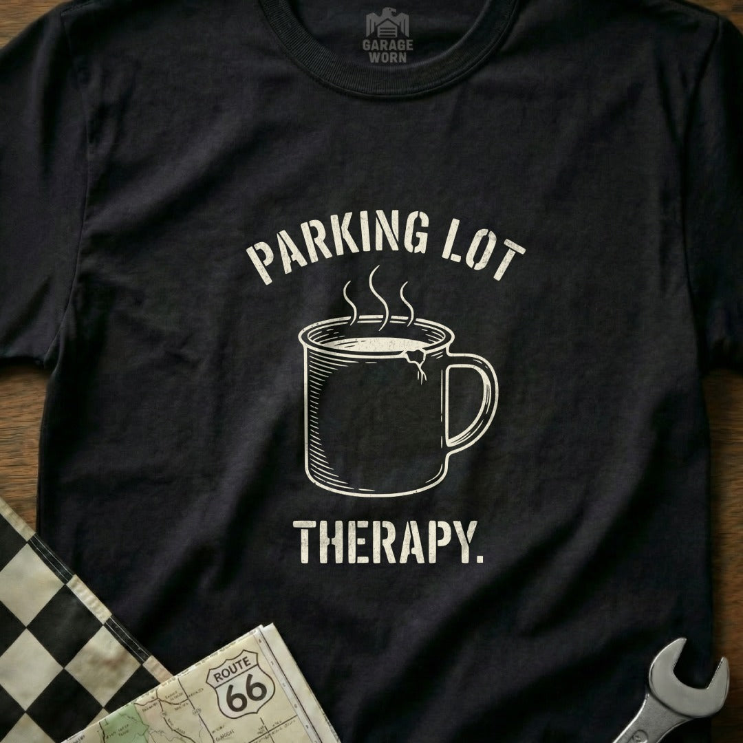 Black t-shirt with "PARKING LOT THERAPY." and steaming mug graphic.