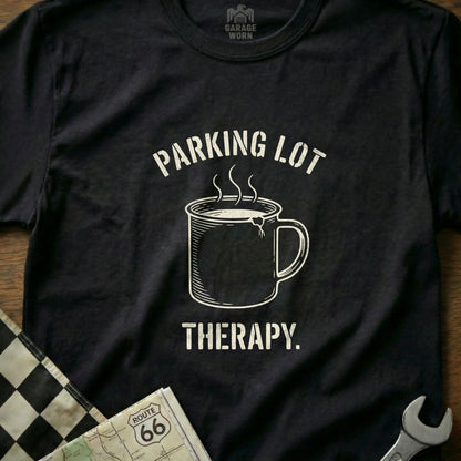 Black t-shirt with "PARKING LOT THERAPY." and steaming mug graphic.