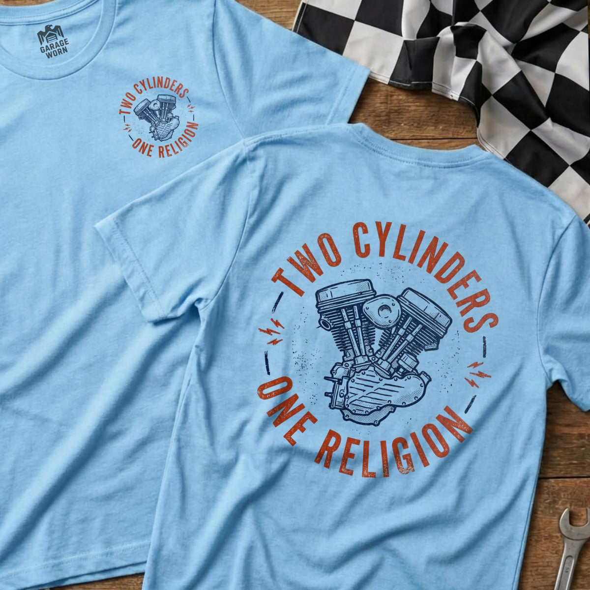 Light blue t-shirt with "Two Cylinders One Religion" and motorcycle engine graphic.