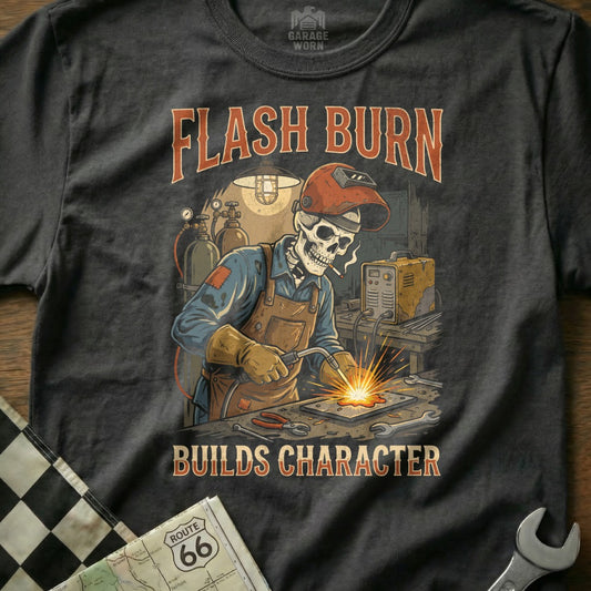 Skeleton welder in helmet and apron sparks metalwork, text "Flash Burn Builds Character".