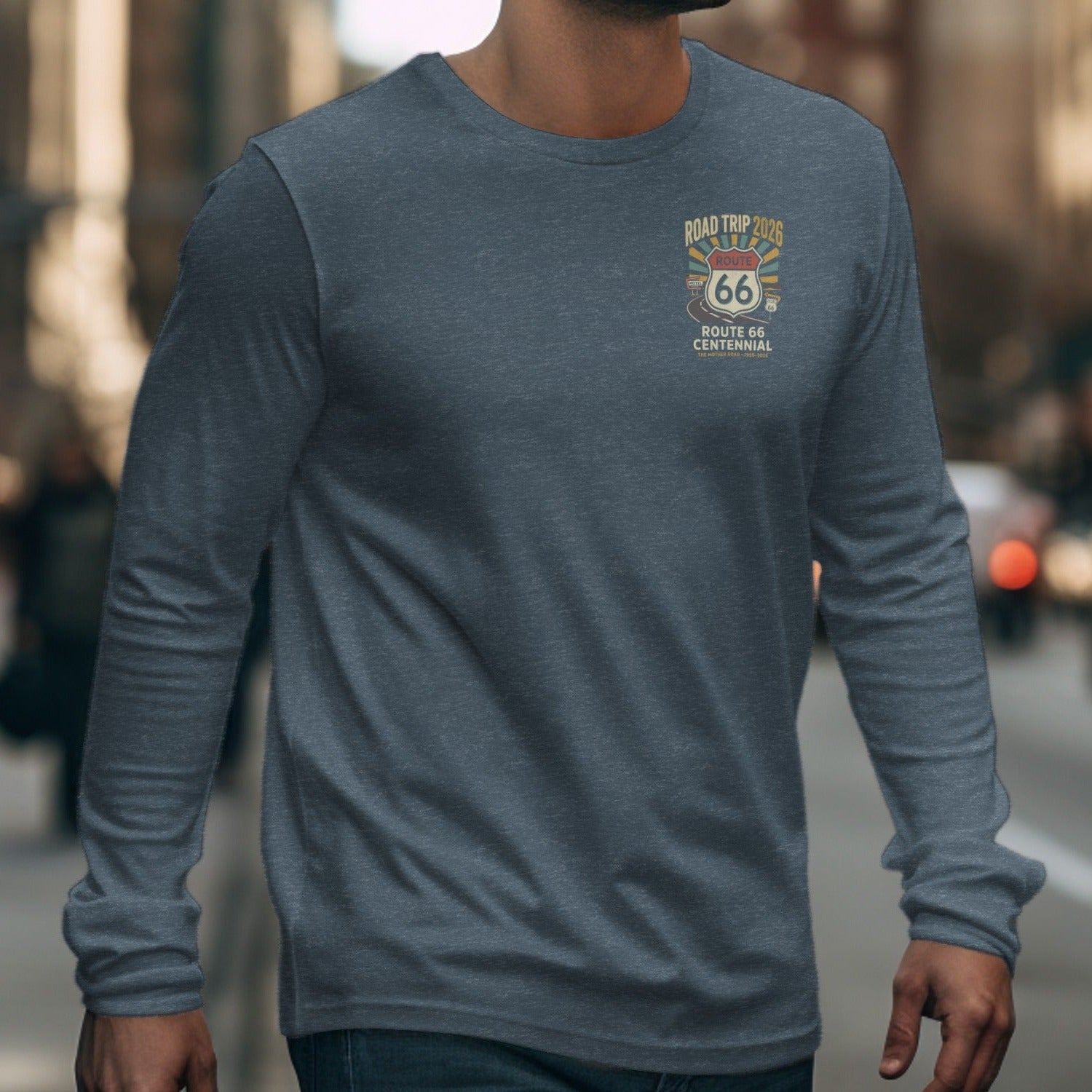 Grey long-sleeve shirt with Route 66 Centennial Road Trip 2026 graphic.