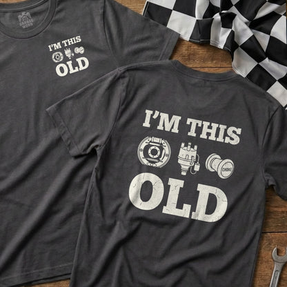 T-shirt with "I'm This Old" text and vintage car parts illustrations.