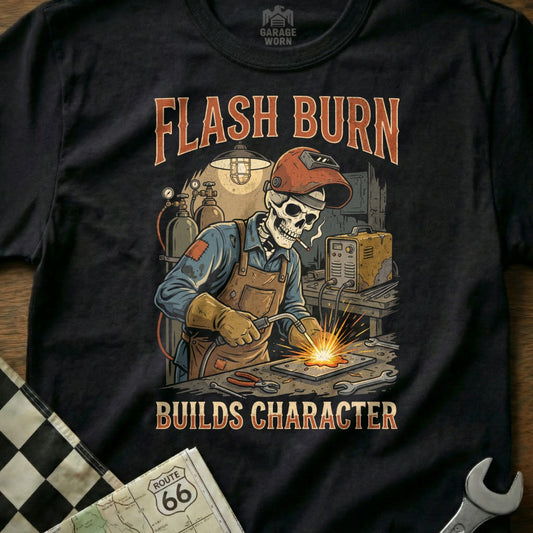 Skeleton welder working at a workbench with "Flash Burn Builds Character" text.