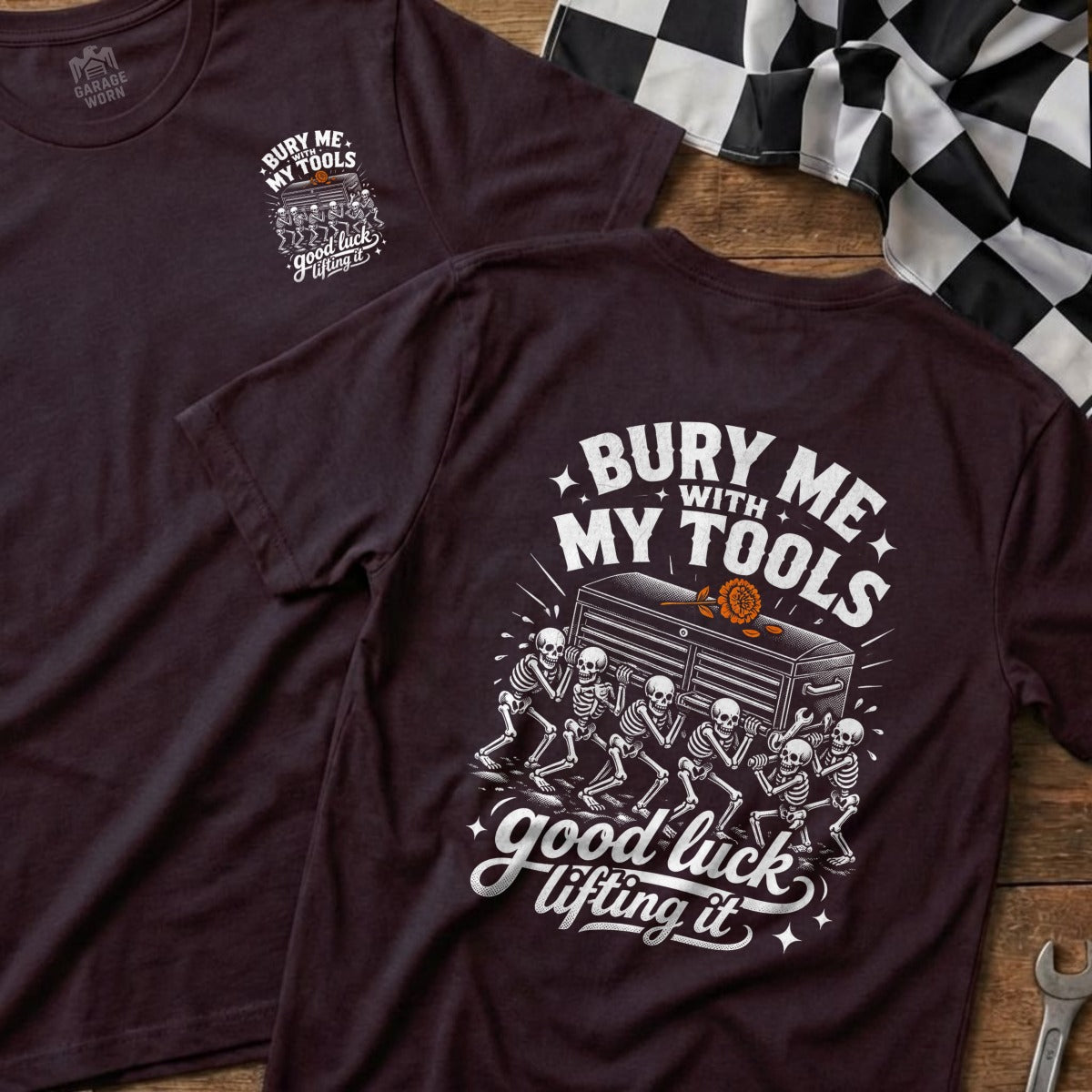 T-shirt with skeletons carrying a toolbox and the text "Bury Me With My Tools".