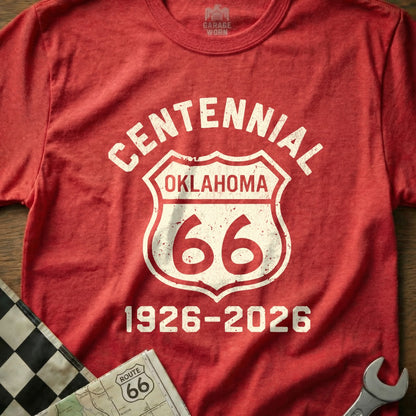Red t-shirt with "Centennial Oklahoma Route 66 1926-2026" text in a shield.
