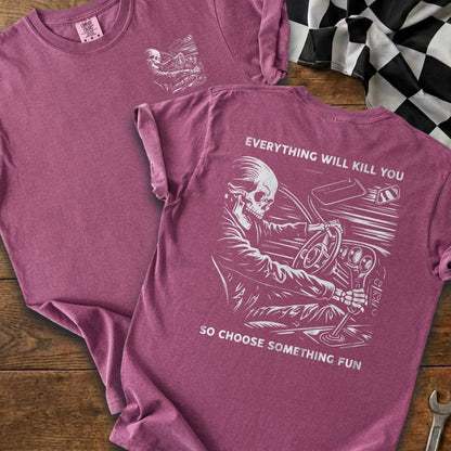 T-shirt with skeleton driving and text: Everything will kill you, so choose something fun.