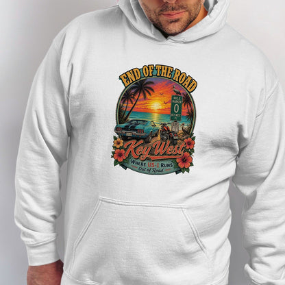 Key West graphic with vintage car, motorcycle, sunset, palm trees, and text.