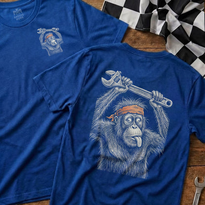 Blue t-shirt with cartoon orangutan holding wrench and orange headband.