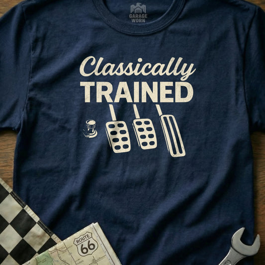 Navy t-shirt with "Classically Trained" text and car pedals.