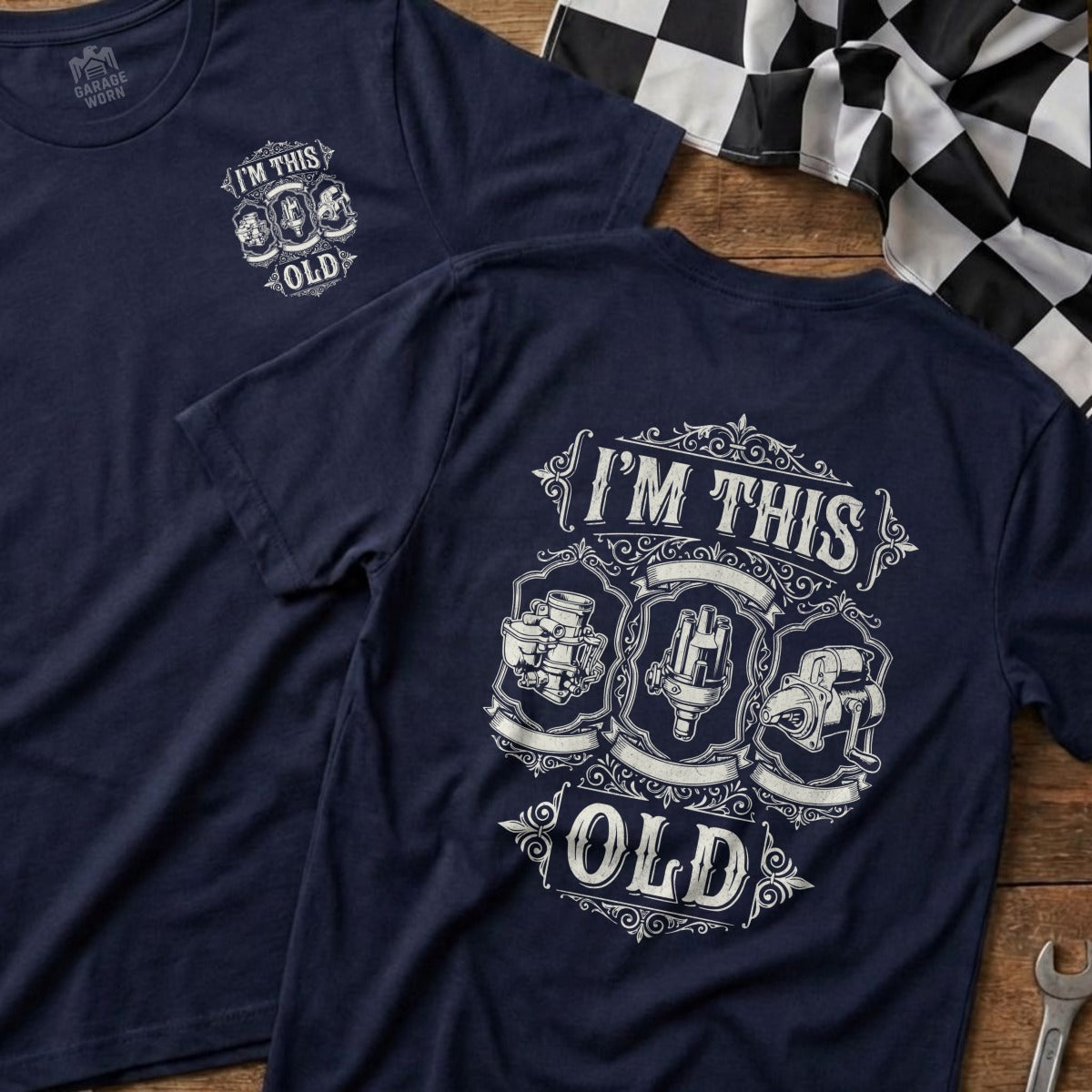 Navy t-shirt with "I'm This Old" text and vintage automotive parts graphic.