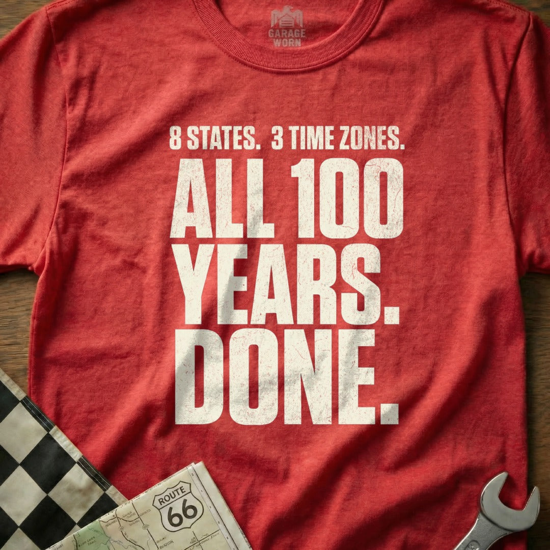 Red t-shirt with "8 STATES. 3 TIME ZONES. ALL 100 YEARS. DONE." text.