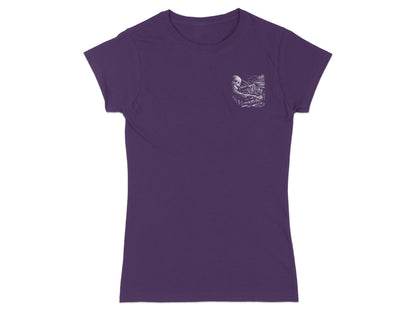 Purple t-shirt with a small black and white pocket print of a skeleton playing piano.