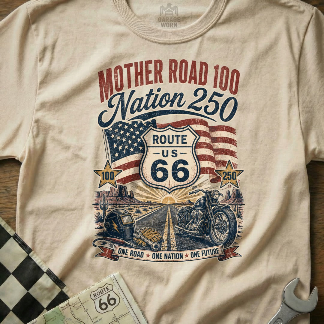"Mother Road 100 Nation 250" t-shirt featuring Route 66, American flag, motorcycle, and desert scene.