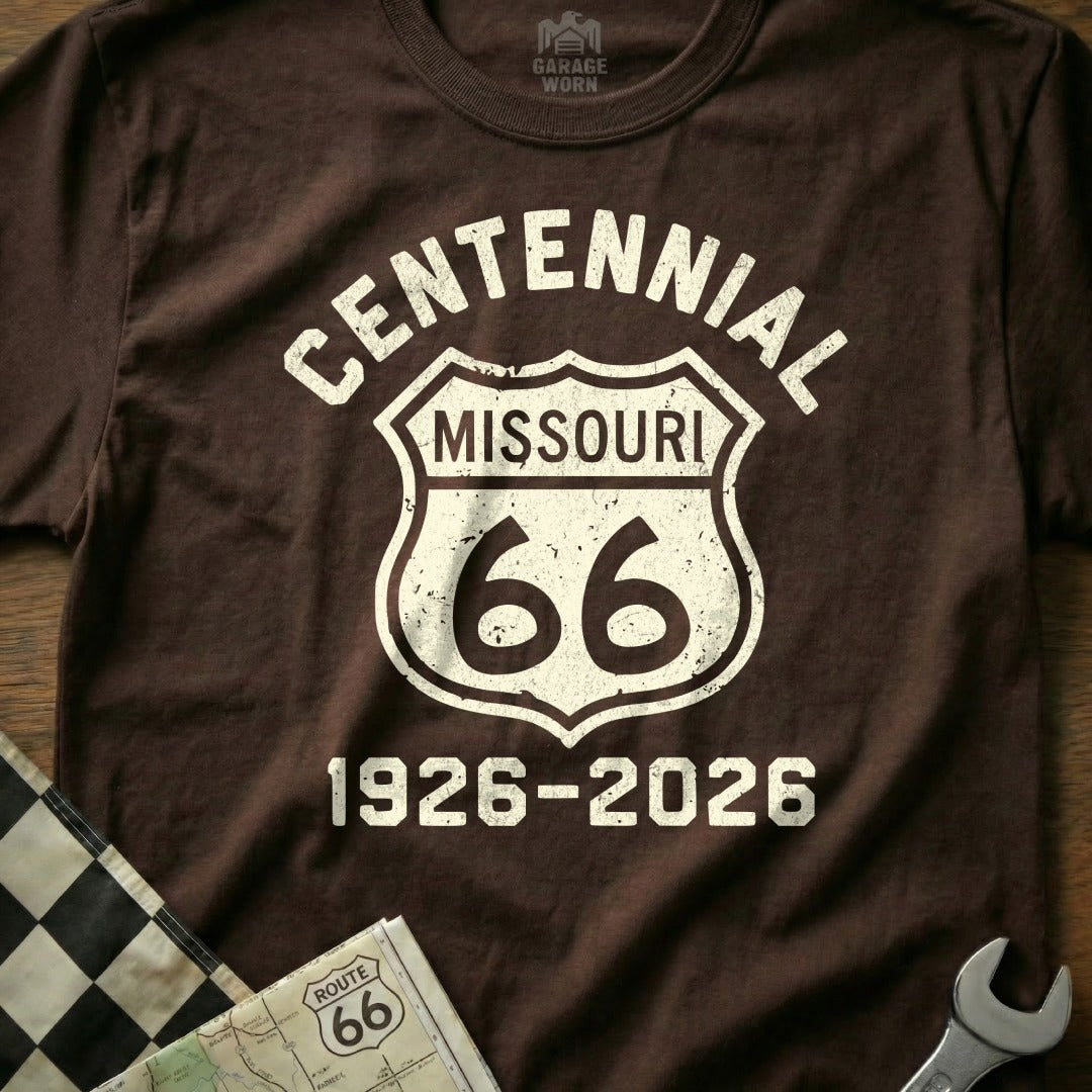 Brown t-shirt with Centennial Missouri Route 66 logo and dates.