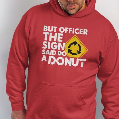 Red hoodie with white text "But Officer The Sign Said Do A Donut" and a yellow roundabout sign.