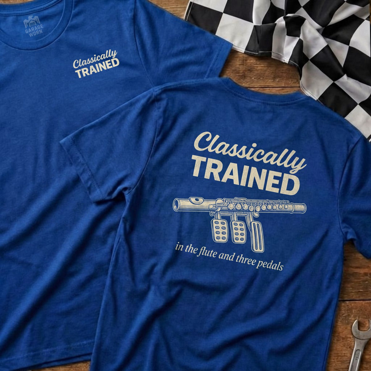Blue t-shirt with "Classically Trained" and flute and pedals graphic.