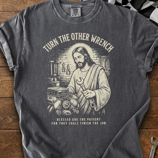 Jesus works on an engine, text says "Turn the other wrench."
