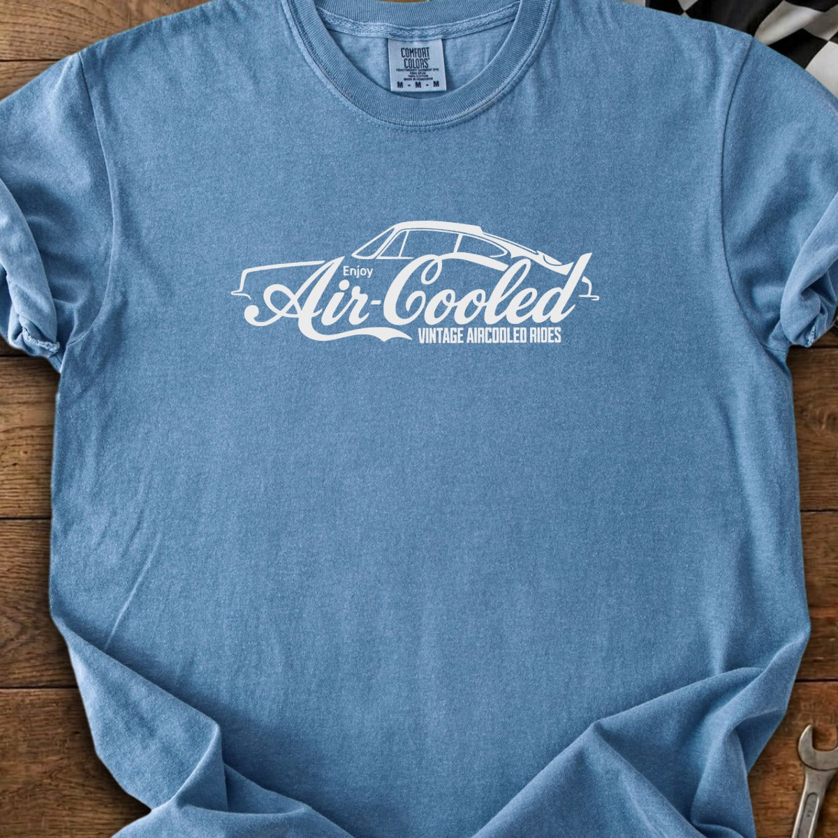 Blue t-shirt with white "Enjoy Air-Cooled Vintage Aircooled Rides" text and car graphic.