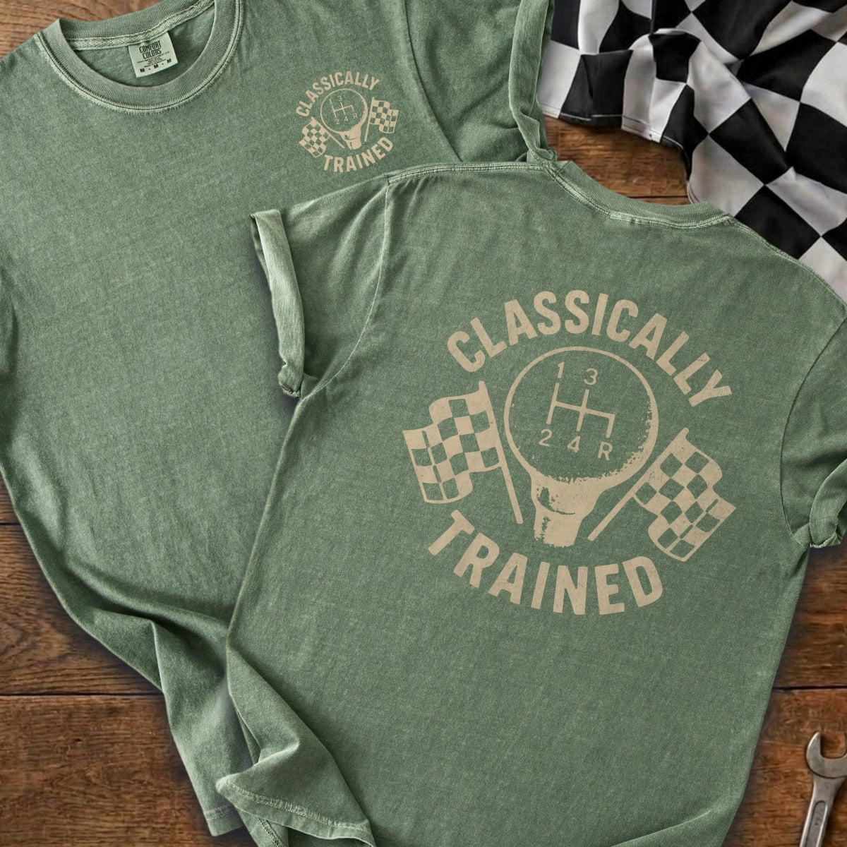 Green t-shirt with "Classically Trained" text and a gear shift design.