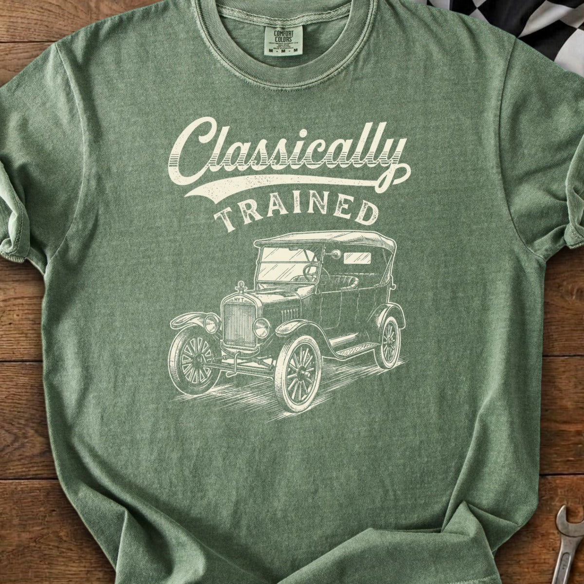 Green t-shirt with "Classically TRAINED" text and vintage car sketch.