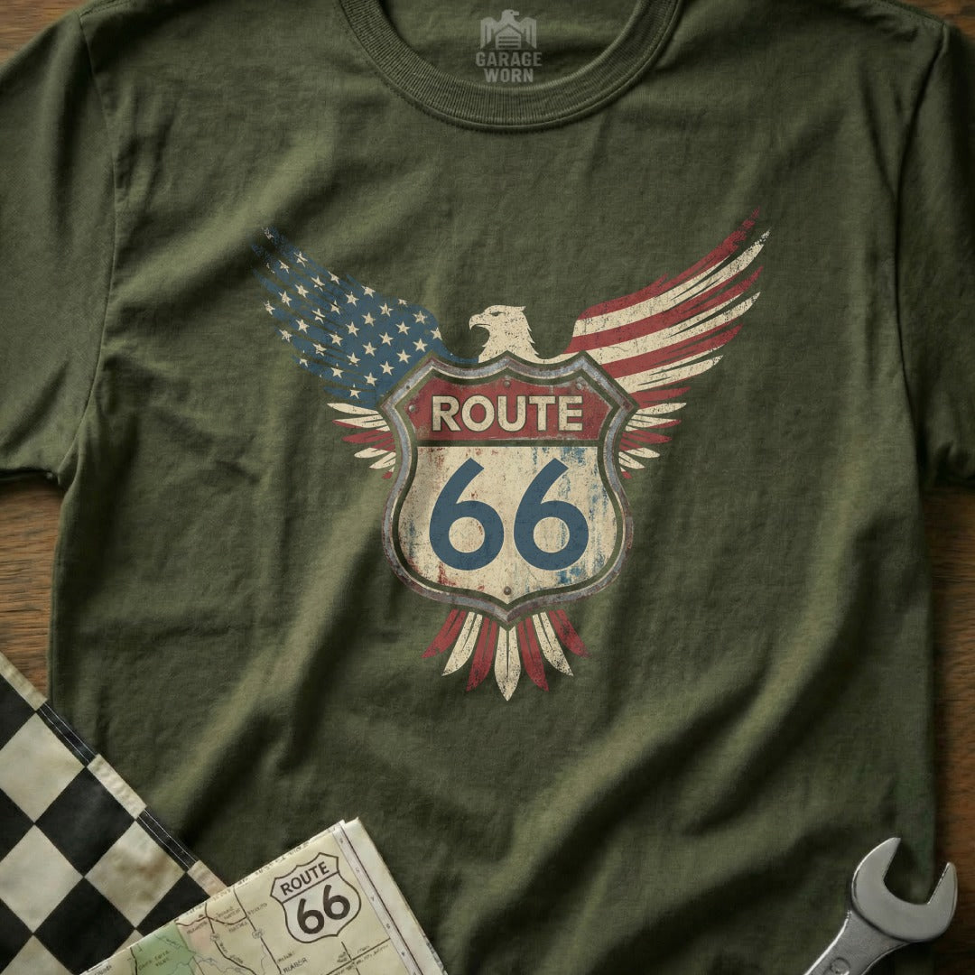 Eagle with Route 66 shield and US flag wings on a green t-shirt.