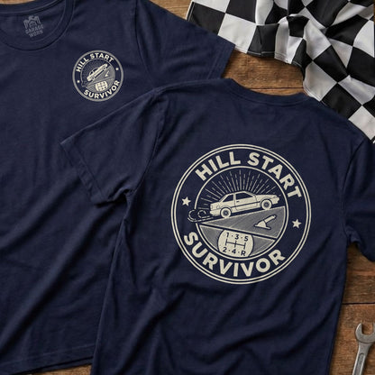Navy t-shirt with "Hill Start Survivor" text and truck graphic.