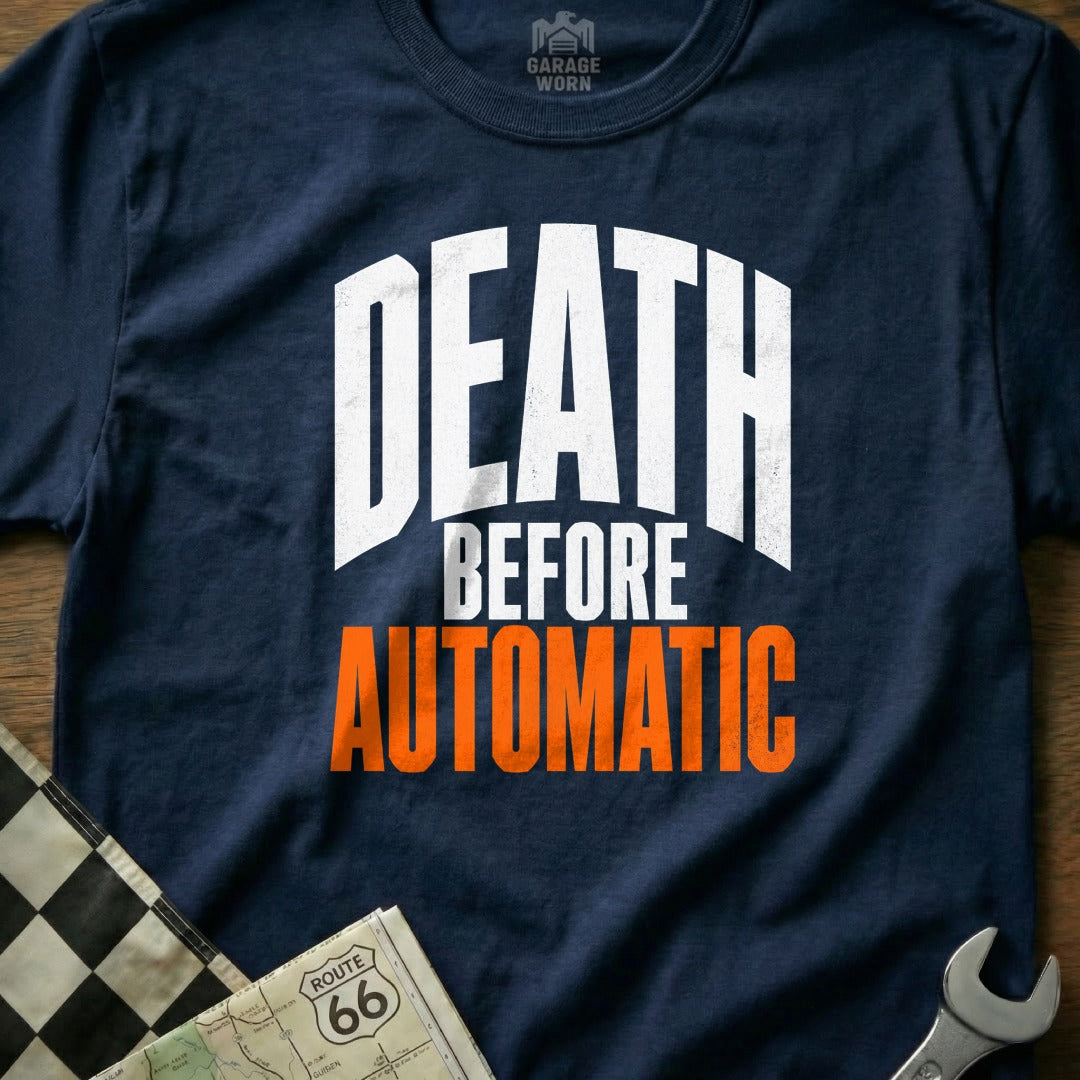 Navy t-shirt with white text "DEATH BEFORE AUTOMATIC" and "GARAGE WORN" logo.