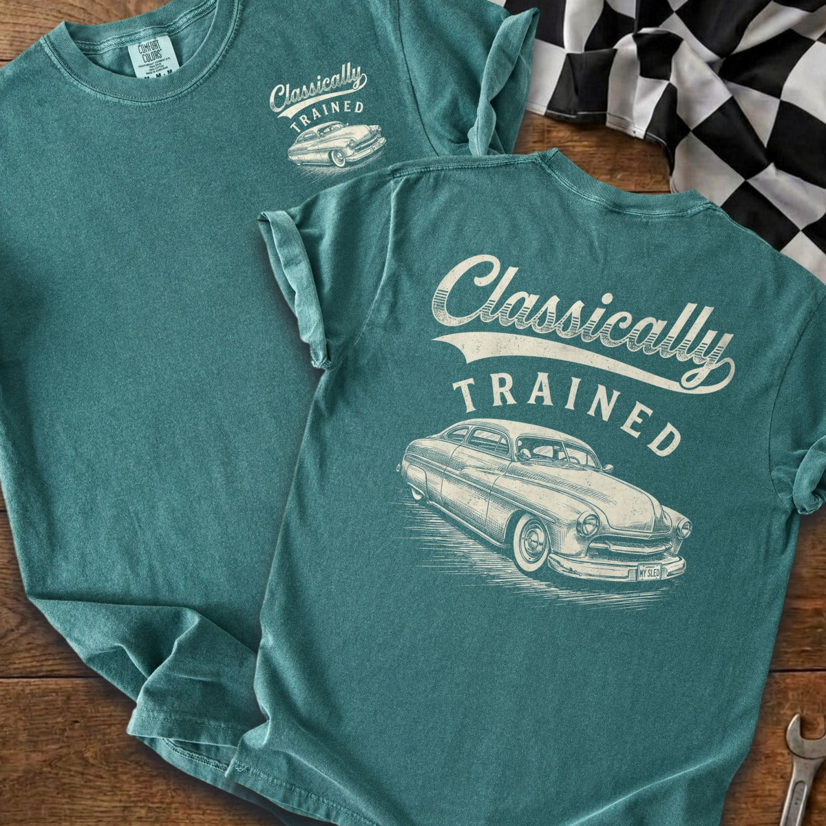 Teal t-shirt with "Classically TRAINED" and a vintage car graphic.