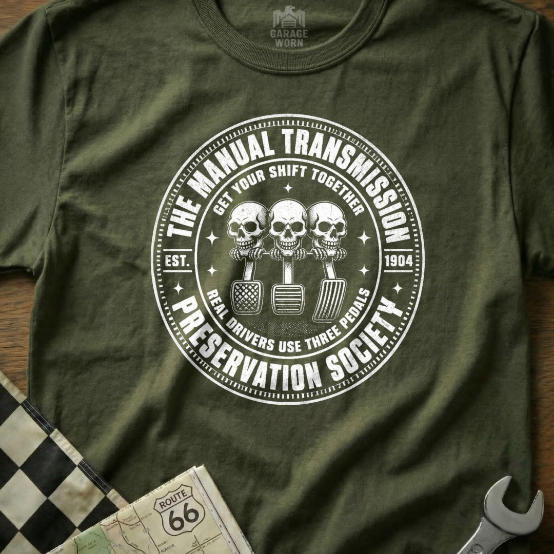 Manual Transmission Preservation Society t-shirt with skulls and pedals graphic.