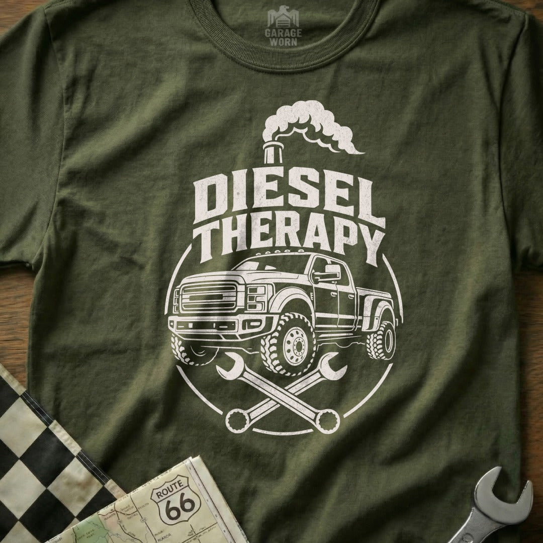 Green t-shirt with "DIESEL THERAPY" text, a pickup truck, and wrenches.