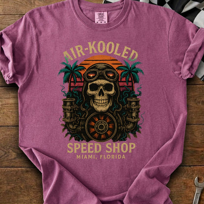 T-shirt with skull wearing goggles, palms, and text "AIR-KOOLEDSPEED SHOP MIAMI, FLORIDA".