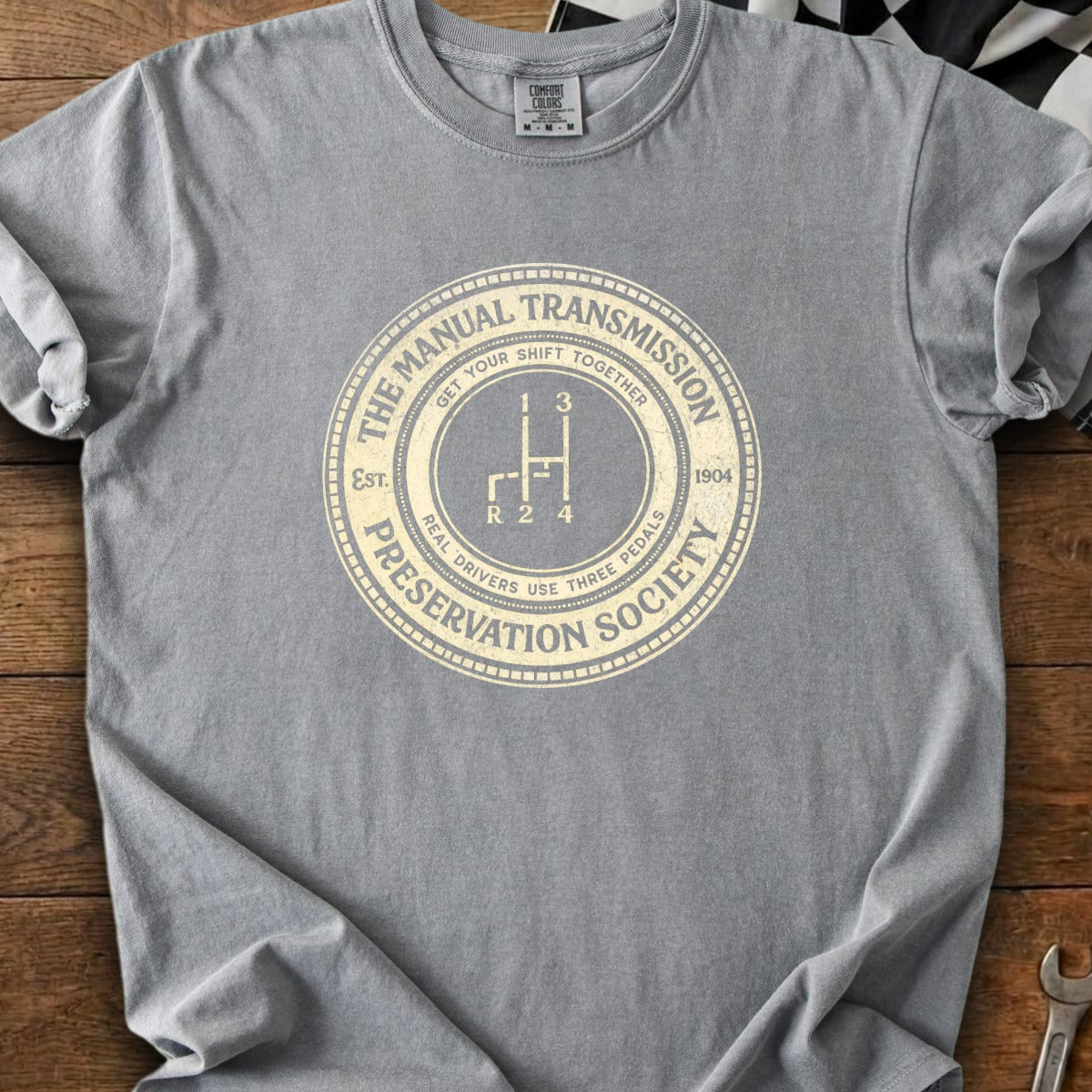 Grey t-shirt with "The Manual Transmission Preservation Society" circular graphic and gear shift.