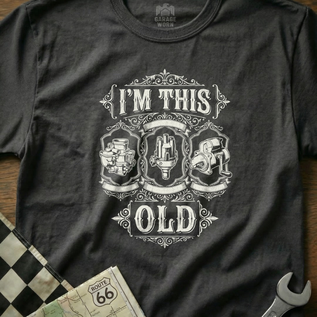 T-shirt with "I'm This Old" and vintage car part graphics.