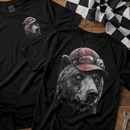 Black t-shirt with a graphic of a bear wearing a red baseball cap and glasses.