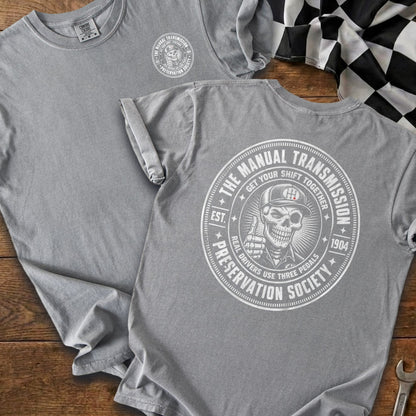 Grey t-shirt with "The Manual Transmission Preservation Society" graphic.