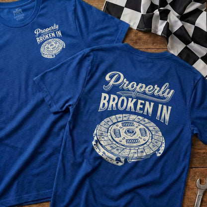 Blue t-shirt with "Properly Broken In" text and clutch disk graphic.