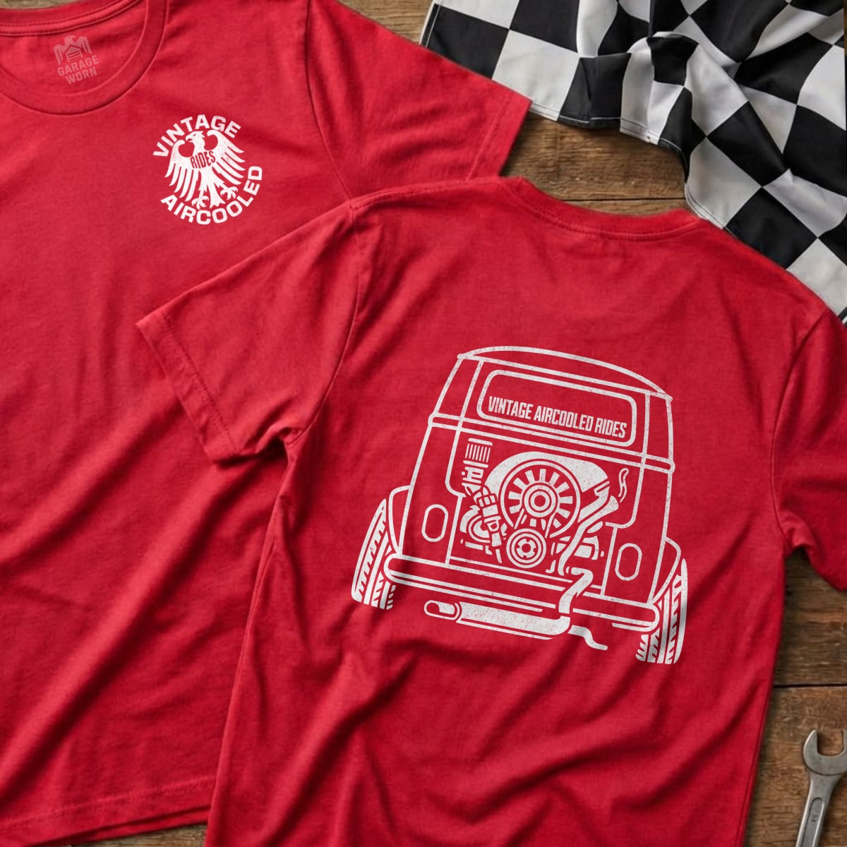 Red t-shirt with a vintage air-cooled vehicle illustration on the back.