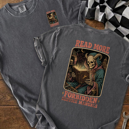 Skeleton in robes reads book with wrench symbol, text "READ MORE FORBIDDEN SERVICE MANUALS".