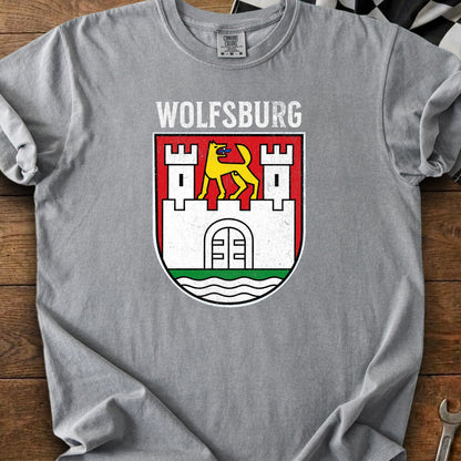 Wolfsburg crest with yellow wolf on white castle wall on red banner.