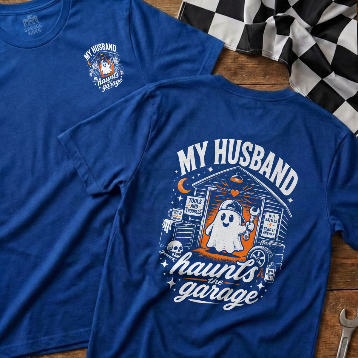 Blue t-shirt with ghost in garage graphic and "My Husband Haunts the Garage" text.
