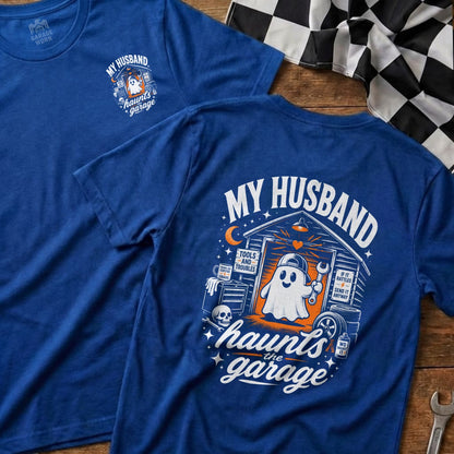 Blue t-shirt with ghost in garage graphic and "My Husband Haunts the Garage" text.