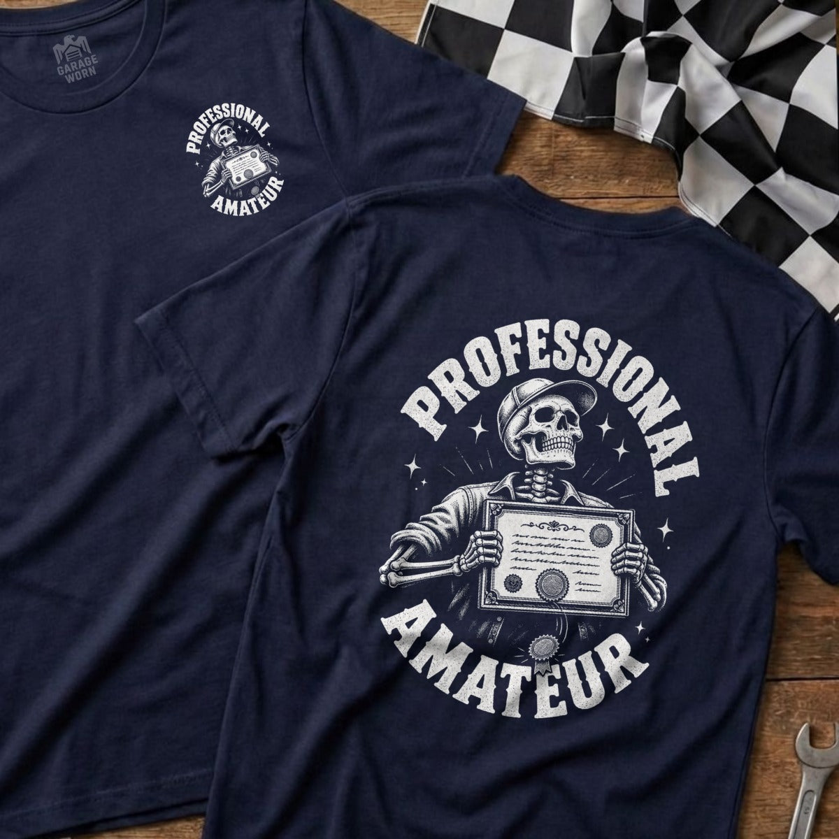 Navy t-shirt with skeleton graphic holding a certificate, text "PROFESSIONAL AMATEUR".