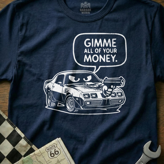 T-shirt with graphic of a car with a gun and speech bubble saying "GIMME ALL OF YOUR MONEY".