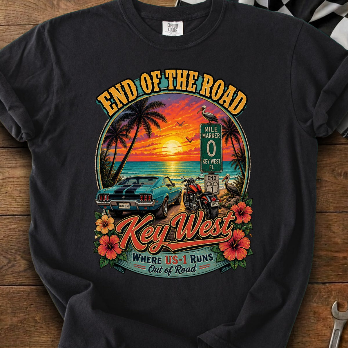 Key West graphic with vintage car, motorcycle, sunset, and text "End of the Road."
