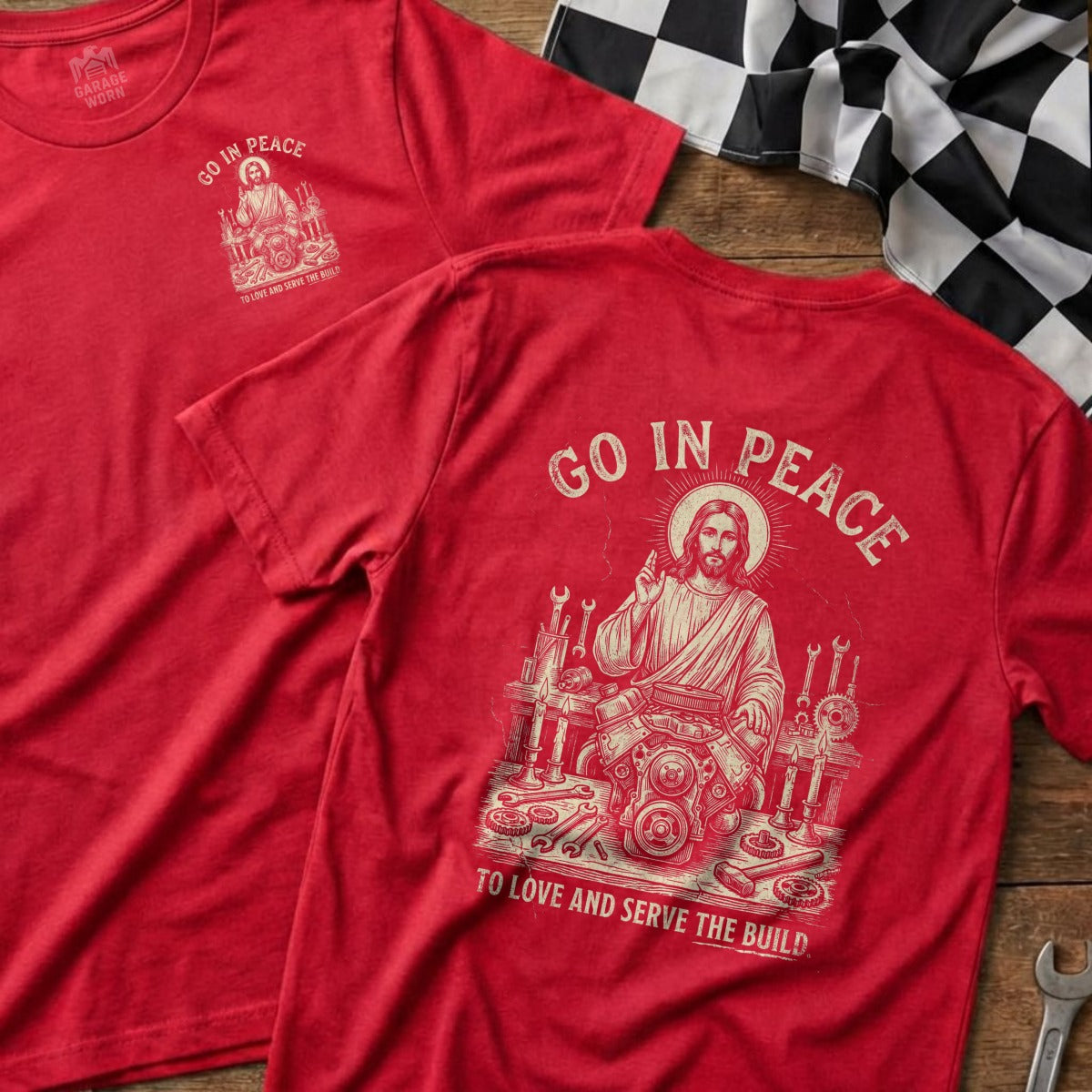 Red t-shirt with "Go in Peace" and Jesus working on an engine.