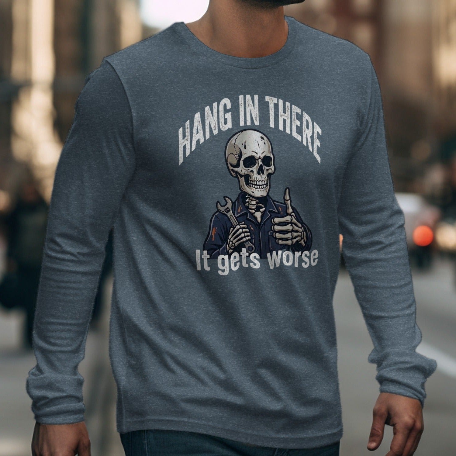 Long sleeve shirt with skeleton graphic reading "Hang in there. It gets worse."