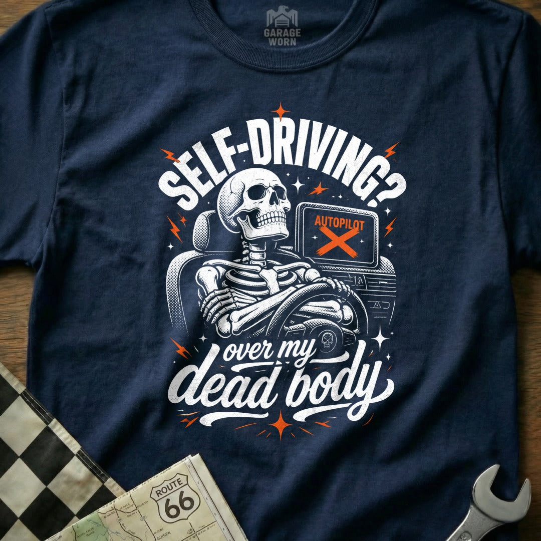 Skeleton driving a car with "Self-Driving? Over My Dead Body" text.