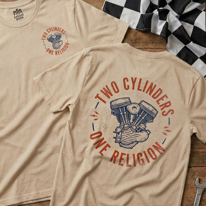 T-shirt with motorcycle engine graphic and "Two Cylinders One Religion" text.